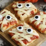 Easy Mummy Pizza Recipe – A fun, spooky Halloween meal idea perfect for parties or family dinners. Ready in just 20 minutes!