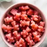 Strawberry gummy bears in pink bowl
